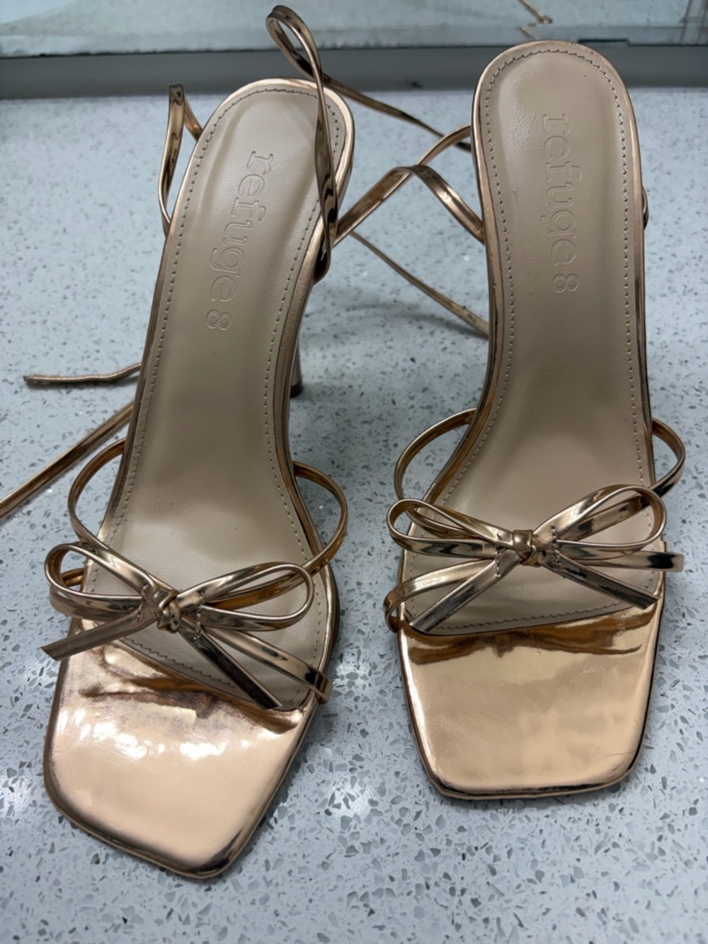 refuge Metallic Rose Gold Bow Strap Heels